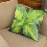 Vibrant Green Hosta Monogramed Throw Pillow<br><div class="desc">This vibrant throw pillow features a captivating closeup photograph of lush, green hosta leaves. The intricate details of the leaves are beautifully captured, showcasing their elegant shape and rich, vibrant colour. Adding a touch of natural beauty to any space, this pillow is a perfect complement to nature-inspired decor. The design...</div>