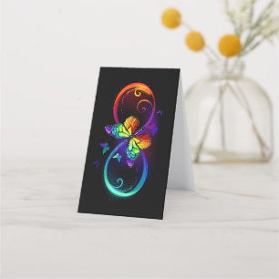 Vibrant infinity with rainbow butterfly on black appointment card