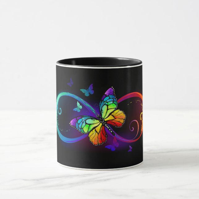 Vibrant infinity with rainbow butterfly on black mug (Center)