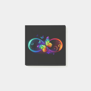 Vibrant infinity with rainbow butterfly on black  post-it notes