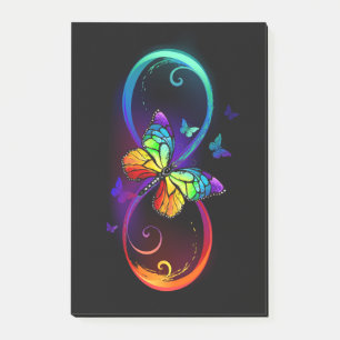 Vibrant infinity with rainbow butterfly on black post-it notes