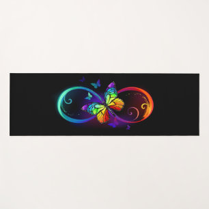 Vibrant infinity with rainbow butterfly on black yoga mat