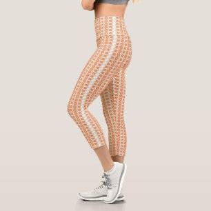Vibrant Orange and White Striped Background with Capri Leggings