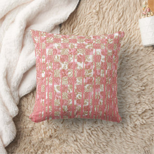 Vibrant pink fabric featuring intricate floral pat cushion