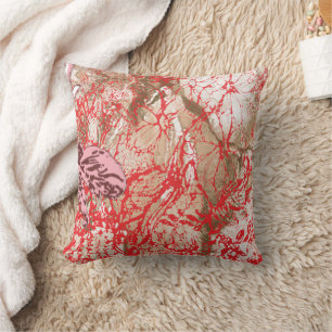Vibrant red fabric design featuring intricate flor cushion