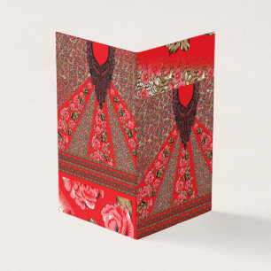 Vibrant red fabric featuring intricate floral and