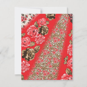 Vibrant red fabric featuring intricate floral and  card