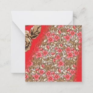 Vibrant red fabric featuring intricate floral and  card