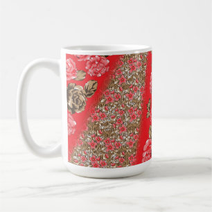 Vibrant red fabric featuring intricate floral and  coffee mug