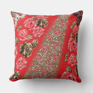 Vibrant red fabric featuring intricate floral and cushion