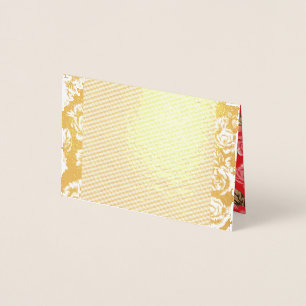 Vibrant red fabric featuring intricate floral and foil card