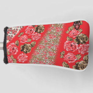Vibrant red fabric featuring intricate floral and golf head cover