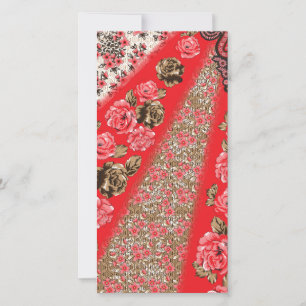 Vibrant red fabric featuring intricate floral and  holiday card