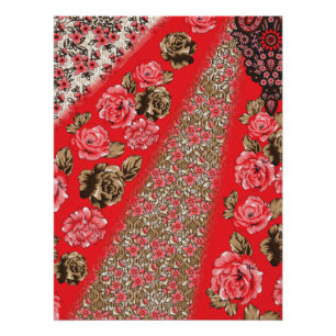 Vibrant red fabric featuring intricate floral and poster
