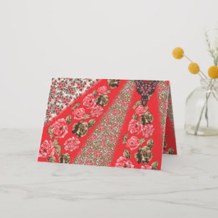 Vibrant red fabric featuring intricate floral and thank you card