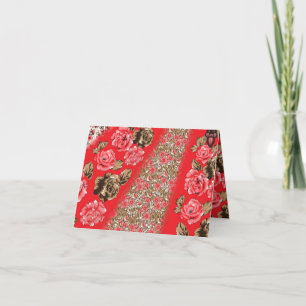 Vibrant red fabric featuring intricate floral and  thank you card