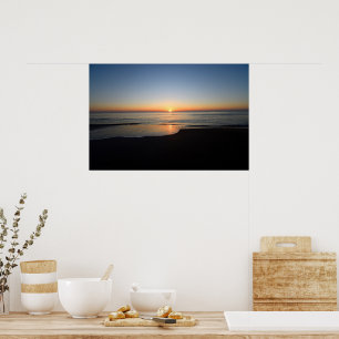 Vibrant sunrise over the ocean poster
