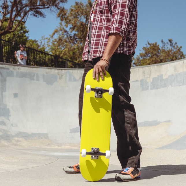 vibrant yellow skateboard features a clean (Outdoor 2)