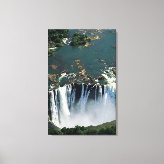 Victoria Falls, Zambia to Zimbabwe border. The Canvas Print (Front)