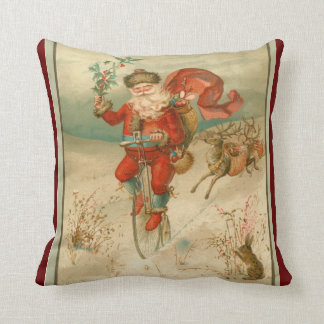 Victorian Santa Claus on high wheel bicycle Cushion