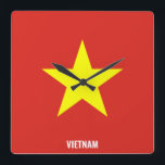Vietnam Flag Dazzling Patriotic Square Wall Clock<br><div class="desc">Vietnam Flag Dazzling Patriotic Square Wall Clock in the colors and the elements of the Vietnam national flag covering the front of the clock. National flag colors are complemented with the text "Vietnam" on the bottom. Text is fully customizable using "Customize it!" feature. Feel free to change it, remove it...</div>