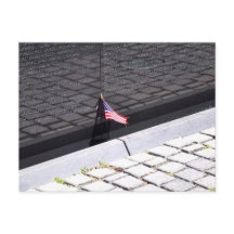 Vietnam Veterans Memorial Wall with American Flag 