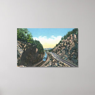 View of a Train Alongside the Highway Canvas Print