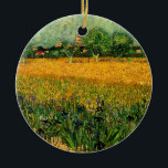 View of Arles with Irises by Vincent van Gogh Ceramic Tree Decoration<br><div class="desc">View of Arles with Irises in the Foreground by Vincent van Gogh is a vintage fine art post impressionism landscape nature painting. A wheat field with purple iris flowers in the foreground on a farm. Trees and the town of Arles with houses are in the background. About the artist: Vincent...</div>