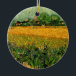 View of Arles with Irises by Vincent van Gogh Ceramic Tree Decoration<br><div class="desc">View of Arles with Irises in the Foreground by Vincent van Gogh is a vintage fine art post impressionism landscape nature painting. A wheat field with purple iris flowers in the foreground on a farm. Trees and the town of Arles with houses are in the background. About the artist: Vincent...</div>