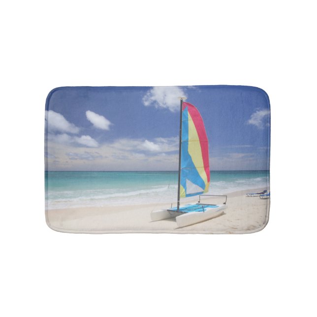 View Of Beach With Sailboat Bath Mat (Front)