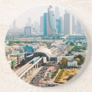View of city metro line and skyscrapers coaster
