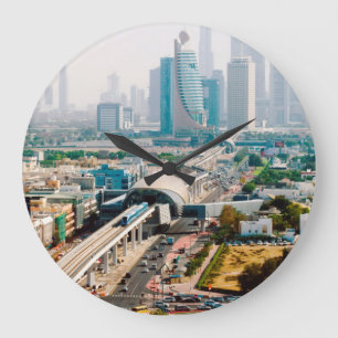 View of city metro line and skyscrapers large clock
