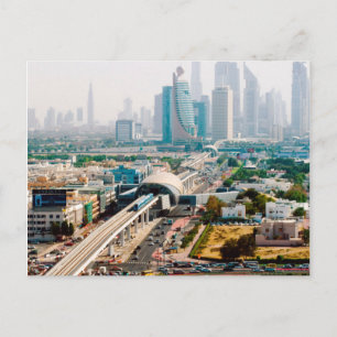 View of city metro line and skyscrapers postcard