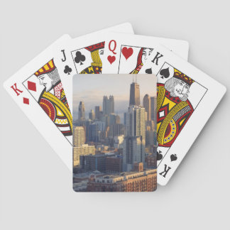 View of cityscape with fantastic light playing cards