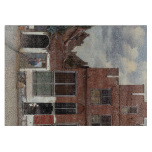 View of houses in Delft by Johannes Vermeer Cutting Board