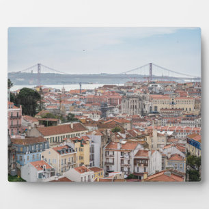 View of Lisbon old town and 25th of April Bridge Plaque