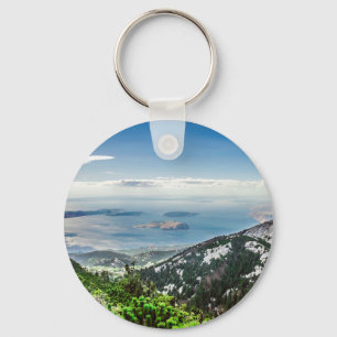 View of sea from mountains key ring