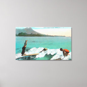 View of Surfers Board Riding, One Taking a Canvas Print