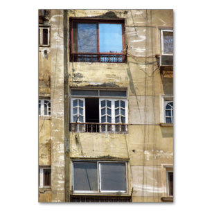  View of the wall with  balconies and windows Table Number
