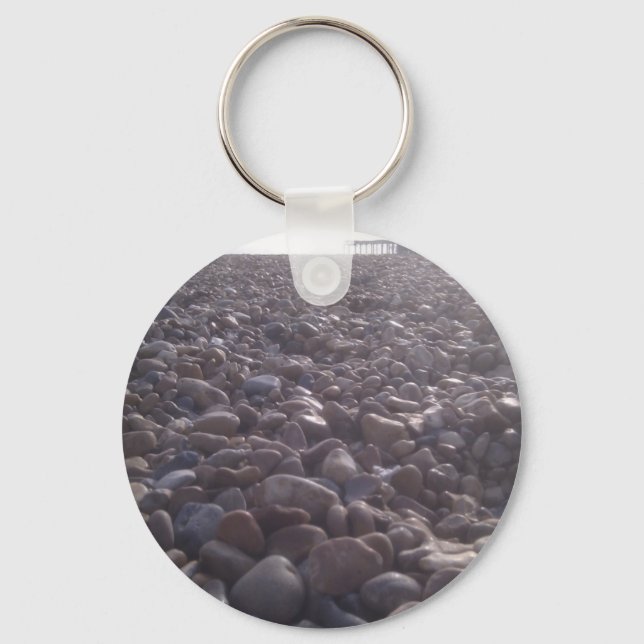 View over pebbles to silouetted West Pier Key Ring (Front)