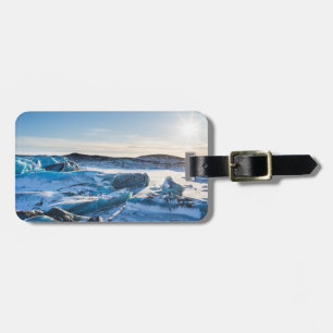 View over the frozen glacial lake luggage tag