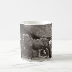 Village blacksmith shoeing a horse coffee mug
