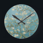 Vincent Van Gogh Branches of Almond Tree Round Clock<br><div class="desc">Vincent Van Gogh Branches of Almond Tree --Almond Blossoms was painted in 1890 in honour of a special event in Vincent's life. On January 31, Vincent's brother Theo and his wife Johanna had a son, and they named him Vincent Willem. Vincent painted this branch of blossoming almond in celebration of...</div>