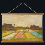 Vincent van Gogh Flower Beds in Holland Hanging Tapestry<br><div class="desc">Turn your wall into a masterpiece! This hanging tapestry features Vincent Van Gogh’s Flower Beds in Holland, alive with radiant reds, golden yellows, lush greens, and calming blues in his expressive post-impressionist brushstrokes. Lightweight and eye-catching, the floral fields create a bold statement that transforms any space into a gallery. Perfect...</div>