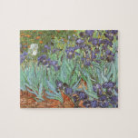 Vincent van Gogh - Irises Jigsaw Puzzle<br><div class="desc">Irises (1889) by Van Gogh is a vintage post impressionism fine art floral nature painting. A group of purple bearded irises and a single white iris flower growing in a garden. It was one of his first paintings while he was at the asylum in Saint-Remy-de-Provence. In 1987 it became the...</div>