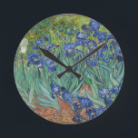Vincent Van Gogh Irises Painting Flowers Art Work Round Clock<br><div class="desc">Vincent Van Gogh - Irises Painting 
Flowers / floral Art Work.
Classic art from one of the worlds most famous painters.
Beautiful purples,  blues and greens to brighten up your day!</div>