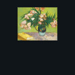 Vincent Van Gogh Oleander Still Life Canvas Print<br><div class="desc">This painting by Vincent Van Gogh, created in August 1888, depicts a vase filled with vibrant oleander flowers. Known for their lively and happy appearance, oleanders were a favourite of Van Gogh, and he captured their essence in this work. The flowers are arranged in a majolica jug, which was frequently...</div>