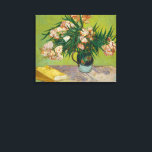 Vincent Van Gogh Oleander Still Life Canvas Print<br><div class="desc">This painting by Vincent Van Gogh, created in August 1888, depicts a vase filled with vibrant oleander flowers. Known for their lively and happy appearance, oleanders were a favourite of Van Gogh, and he captured their essence in this work. The flowers are arranged in a majolica jug, which was frequently...</div>