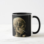 Vincent van Gogh - Skull with Burning Cigarette Mug<br><div class="desc">Head of a Skeleton with a Burning Cigarette / Skull with Burning Cigarette / Crane de squelette fumant une cigarette - Vincent van Gogh,  1885</div>