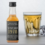 Vintage 50th Birthday Party Favour Black Liquor Bottle Label<br><div class="desc">This 50th birthday party favour is not just for the birthday honoree; it's for everyone to enjoy! The unique "Take a Shot, He's Still Hot" bottle label design adds a funny playful touch to the celebration, setting the mood for laughter, good times, and shared memories. Personalise "Take a Shot He's...</div>